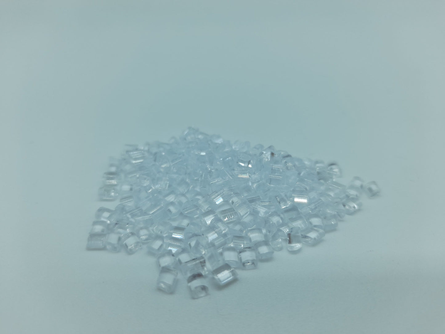 Set of (12) soft drink bottles with ice cubes