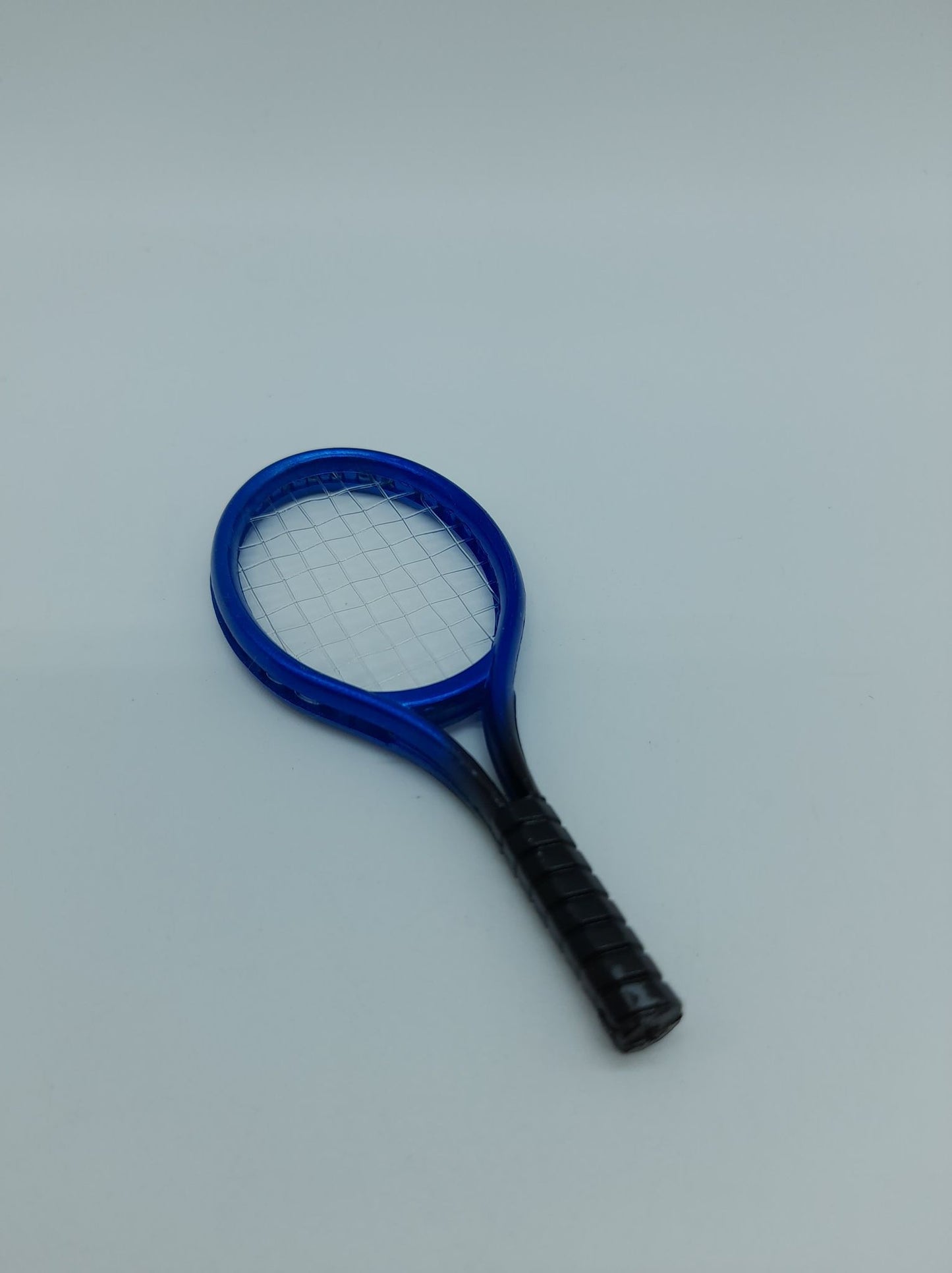 Raquette de tennis 1/6