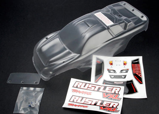 Traxxas   Body, Rustler (clear, requires painting)/window, lights decal sheet/ wing and aluminum hardware