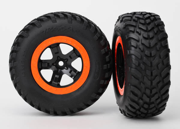 Traxxas Tires & wheels, assembled, glued (SCT black, orange beadlock wheels, dual profile (2.2" outer, 3.0" inner), SCT off-road racing
